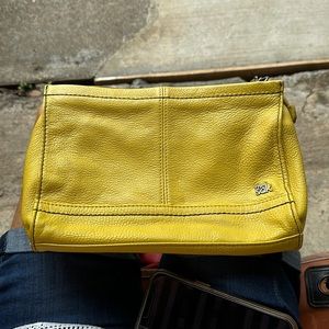 The sak yellow leather cross body. One small flaw.